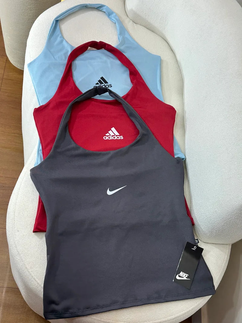 Blusa gringa Nike e adidas